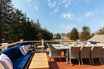 Eastham, Bridge Meadow Cape Cod vacation rental - Large upper deck with outdoor dining and lounge seating