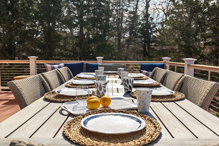 Eastham, Bridge Meadow Cape Cod vacation rental - Outdoor dining table set for easy Cape Cod evenings
