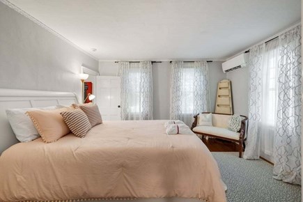 South Yarmouth Cape Cod vacation rental - Main level ensuite primary #1 queen bedroom