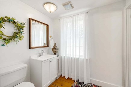 South Yarmouth Cape Cod vacation rental - Main Level half bath off kitchen