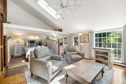 South Yarmouth Cape Cod vacation rental - Guest suite queen bedroom #7 connected to rear of barn on the main level