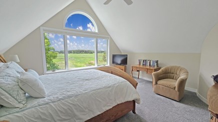 Wellfleet Cape Cod vacation rental - Second floor primary bedroom with queen bed and ensuite bathroom