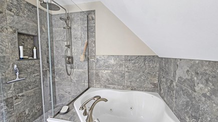 Wellfleet Cape Cod vacation rental - Second floor primary ensuite bathroom with separate tub & shower