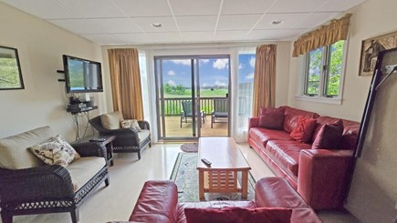 Wellfleet Cape Cod vacation rental - Lower-level family room with slider to lower deck
