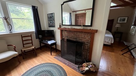 Wellfleet Cape Cod vacation rental - Living Room with Fireplace, Loveseat and Smart TV