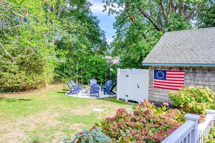 South Yarmouth Cape Cod vacation rental - View from the deck to the outdoor recreation spaces