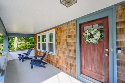 South Yarmouth Cape Cod vacation rental - Wonderful covered porch with seating