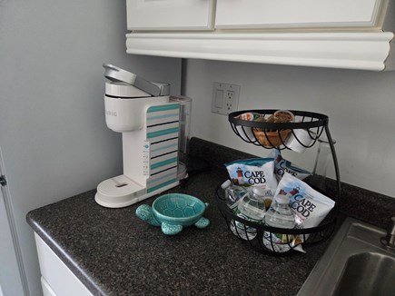 Harwichport Cape Cod vacation rental - Kitchen Keurig w/ complimentary welcome snacks, water and pods.