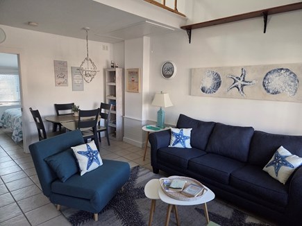 Harwichport Cape Cod vacation rental - Liiving room with queen size pull-out couch & dining table for 4