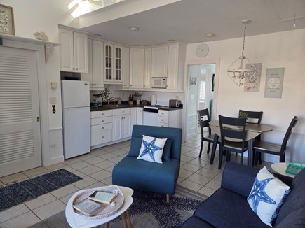 Harwichport Cape Cod vacation rental - Living room and fully equipped kitchen and dining area.