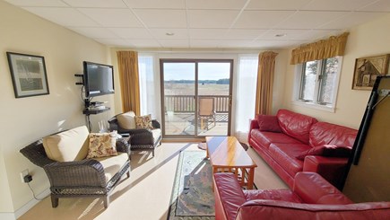 Wellfleet Cape Cod vacation rental - Family room in lower level with slider to lower deck