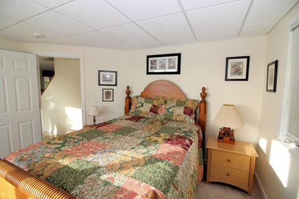 Wellfleet Cape Cod vacation rental - Lower level bedroom with queen bed and tidal marsh view