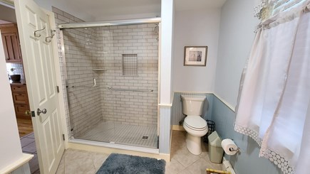 Wellfleet Cape Cod vacation rental - First floor bathroom with shower and washer/dryer