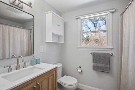 Eastham Cape Cod vacation rental - First floor master bathroom with bath/shower combo