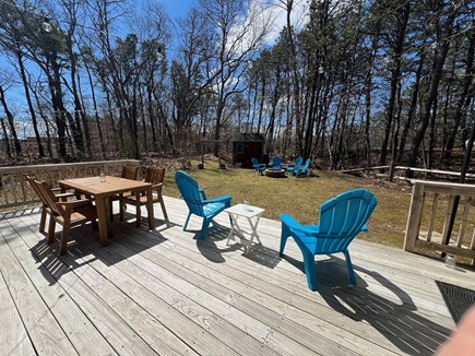 Eastham Cape Cod vacation rental - Backyard deck with outdoor seating