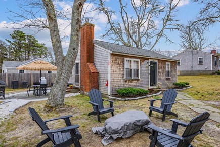 Dennis Port Cape Cod vacation rental - Adirondack chairs with a fire pit perfect for a family gathering