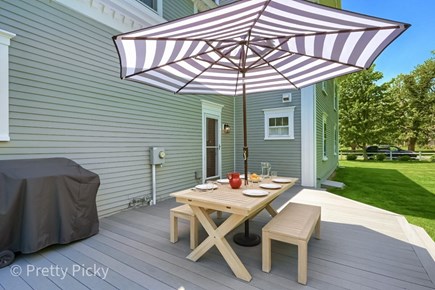 Harwich Port Cape Cod vacation rental - Large deck with dining and a newer gas grill