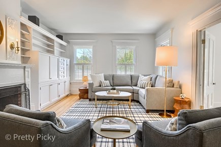 Harwich Port Cape Cod vacation rental - Main living room.  There's a TV in the cabinet