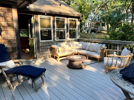 Wellfleet Cape Cod vacation rental - Back patio with teak steamer chairs, sectional, gas firepit