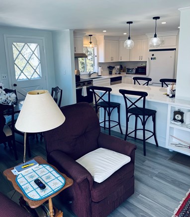 Popponessett Cape Cod vacation rental - Kitchen with Island (new), dining area into living room