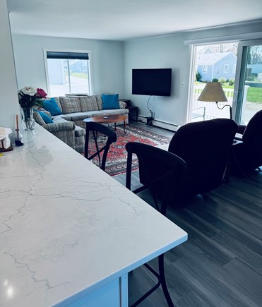 Popponessett Cape Cod vacation rental - Kitchen view into living room.