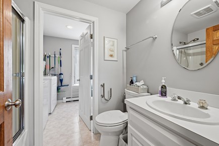 Dennis Cape Cod vacation rental - Middle Floow Ful Bath with Washer/Dryer Room Beyond