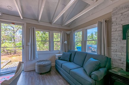 East Sandwich Cape Cod vacation rental - Living room with coastal white washed brick walls