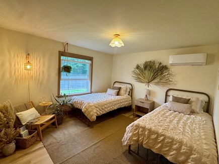 Eastham Cape Cod vacation rental - Sand & dune-inspired bedroom with 2 twin beds & cozy reading nook
