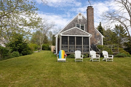 Eastham Cape Cod vacation rental - Back of house standing down by the marsh.