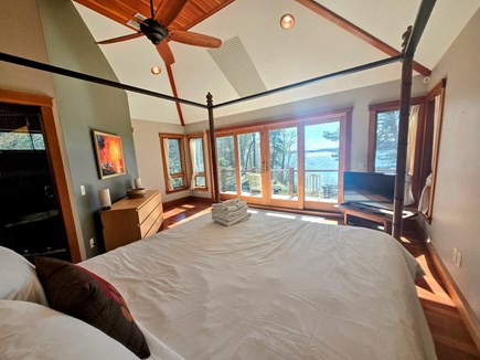 Brewster, Upper Mill Pond Cape Cod vacation rental - Master bedroom main house. Upper level waterviews, bathroom, tv