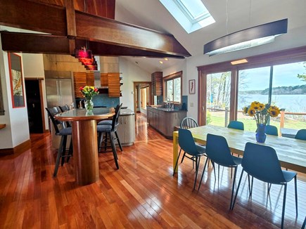 Brewster, Upper Mill Pond Cape Cod vacation rental - Dining area & kitchen in the main house with a view of the pond