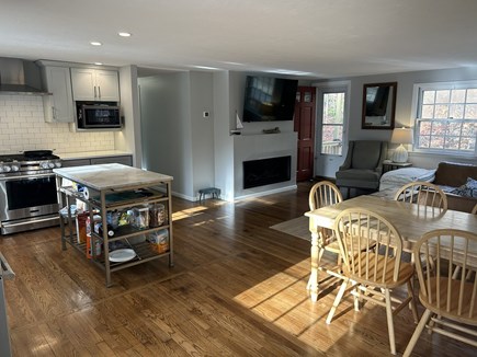 Truro, Longnook Cape Cod vacation rental - Open concept kitchen & living room with gas fireplace