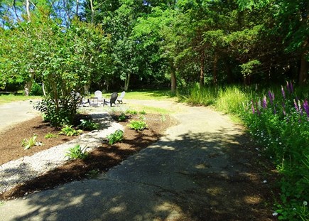 Eastham Cape Cod vacation rental - Back yard circular drive, gardens 