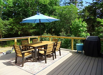 Eastham Cape Cod vacation rental - Deck with grill, overlooking fire pit and back yard 