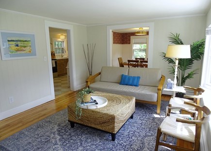 Eastham Cape Cod vacation rental - Living room opens to kitchen and dining areas 