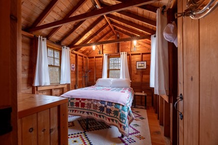 Eastham Cape Cod vacation rental - Primary bedroom with windows on three walls to enjoy the breeze!