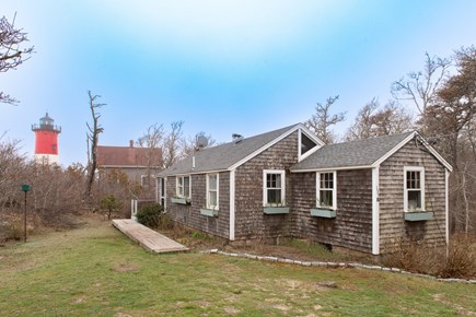Eastham Cape Cod vacation rental - Our cottage next to Nauset Light! Flowers blooming soon...promise