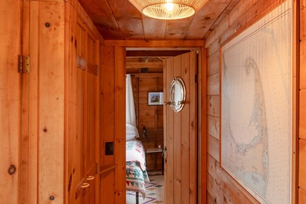 Eastham Cape Cod vacation rental - Cozy cabin feel with a big map of the cape in the hallway.