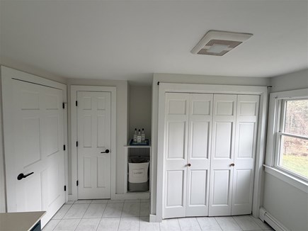 Eastham, Salt Pond Seashore Cape Cod vacation rental - Upstairs landing with storage and laundry nook.