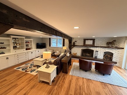 Eastham, Salt Pond Seashore Cape Cod vacation rental - Bright open living room with wood floors and brick hearth.
