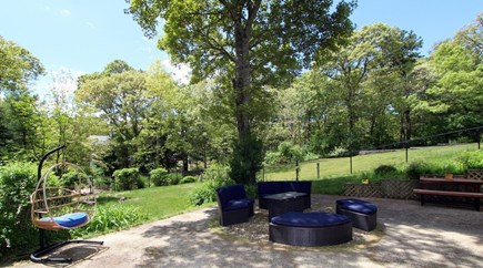 Eastham, Salt Pond Seashore Cape Cod vacation rental - Spacious outdoor patio with lounge seating, private yard.