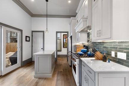 Provincetown, The Tucker House Cape Cod vacation rental - Well-equipped kitchen with island, easy to cook and host.