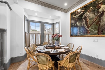 Provincetown, The Tucker House Cape Cod vacation rental - Dining area seats 8 with natural light for shared meals.