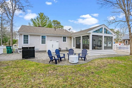 Cotuit Cape Cod vacation rental - Back patio with grill and outdoor shower