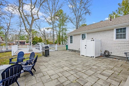 Cotuit Cape Cod vacation rental - Back patio with grill and outdoor shower