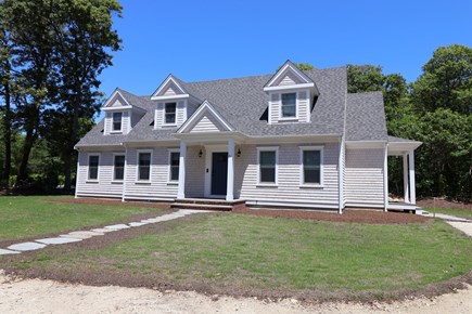 Brewster Cape Cod vacation rental - Front of home - Grass coming in and driveway gravel or shell soon