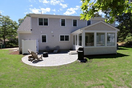 Brewster Cape Cod vacation rental - Rear of home with outside shower on left<br/>