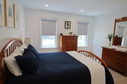 Brewster Cape Cod vacation rental - First level guest bedroom with full custom bath across hall.