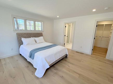 Brewster Cape Cod vacation rental - Primary bedroom on first floor with beautiful full bath