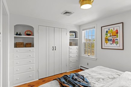 Eastham Cape Cod vacation rental - The bedroom has built in storage, wood floors, and natural light